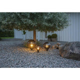 Dekorative runde Gartenleuchte mit Smokey-Glas und einer E27 Fassung.